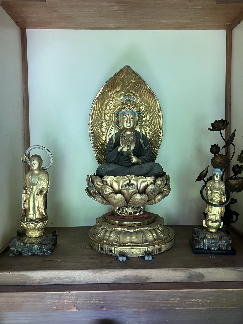 A golden Buddha enshrined in the hall